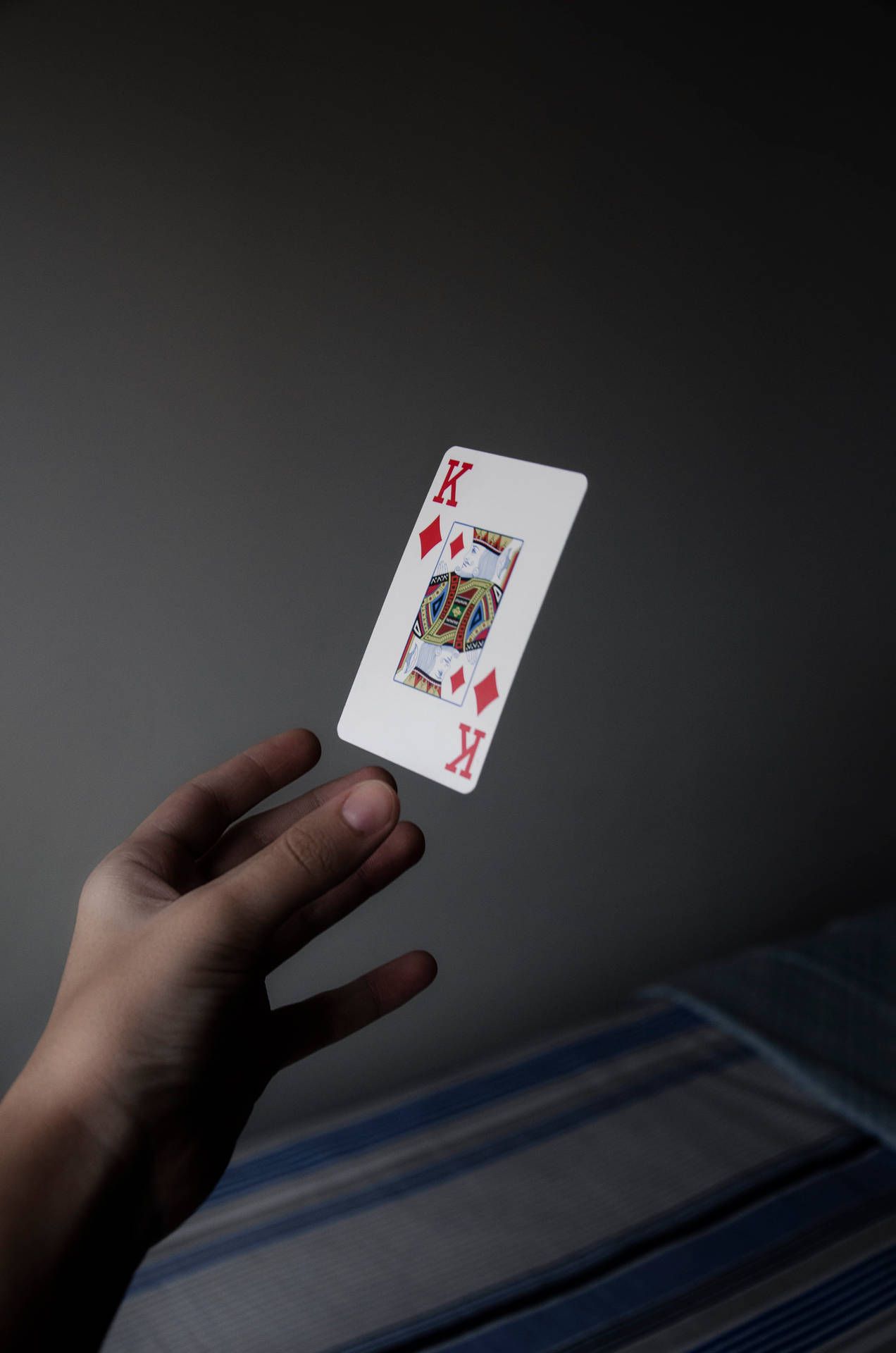 1272x1920 Download A High flying King of Hearts in the realm of cards Wallpaper