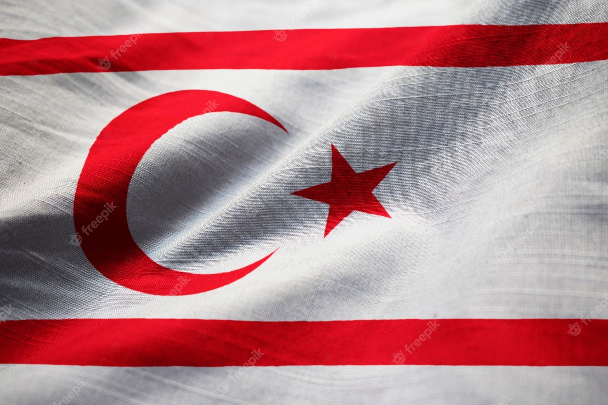 2000x1333 Premium Photo. Closeup of ruffled turkish republic of northern cyprus flag