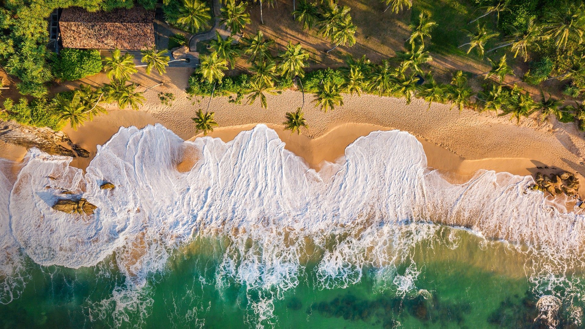 1920x1080 Sandy beach at sunset aerial view, Tangalle, Sri Lanka. Windows Spotlight Image