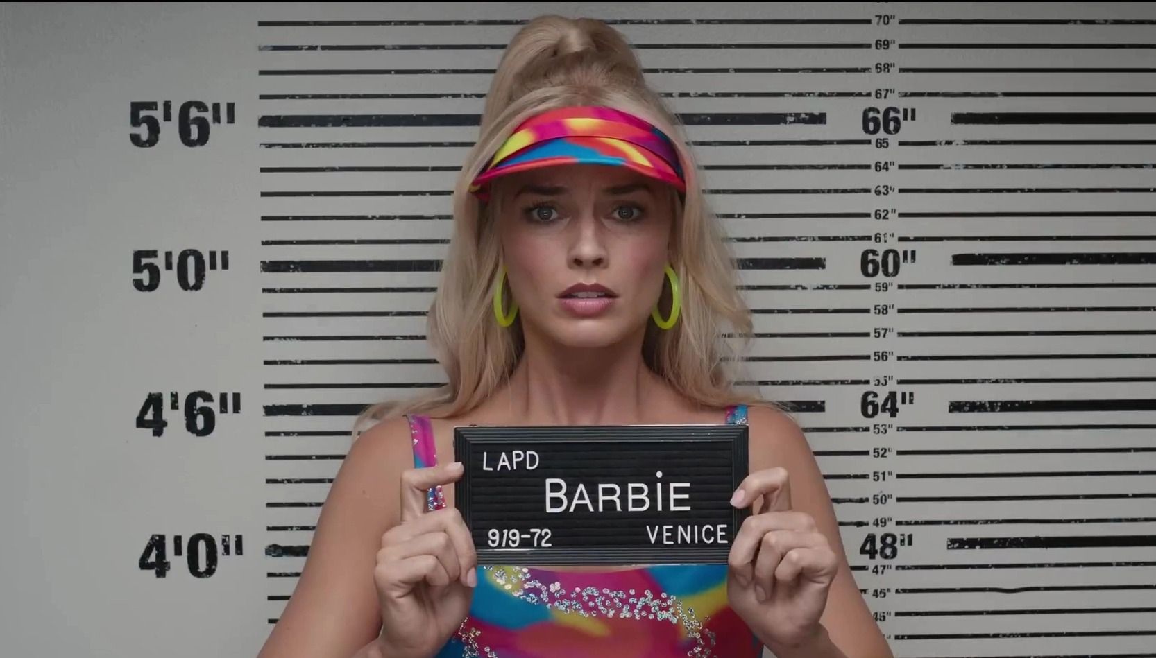 1666x949 Margot Robbie shows Barbie's no pushover in new movie as she poses for police mugshot. The US Sun