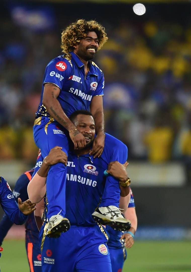 759x1078 Download Celebrated Mumbai Indians players Malinga and Pollard in action. Wallpaper
