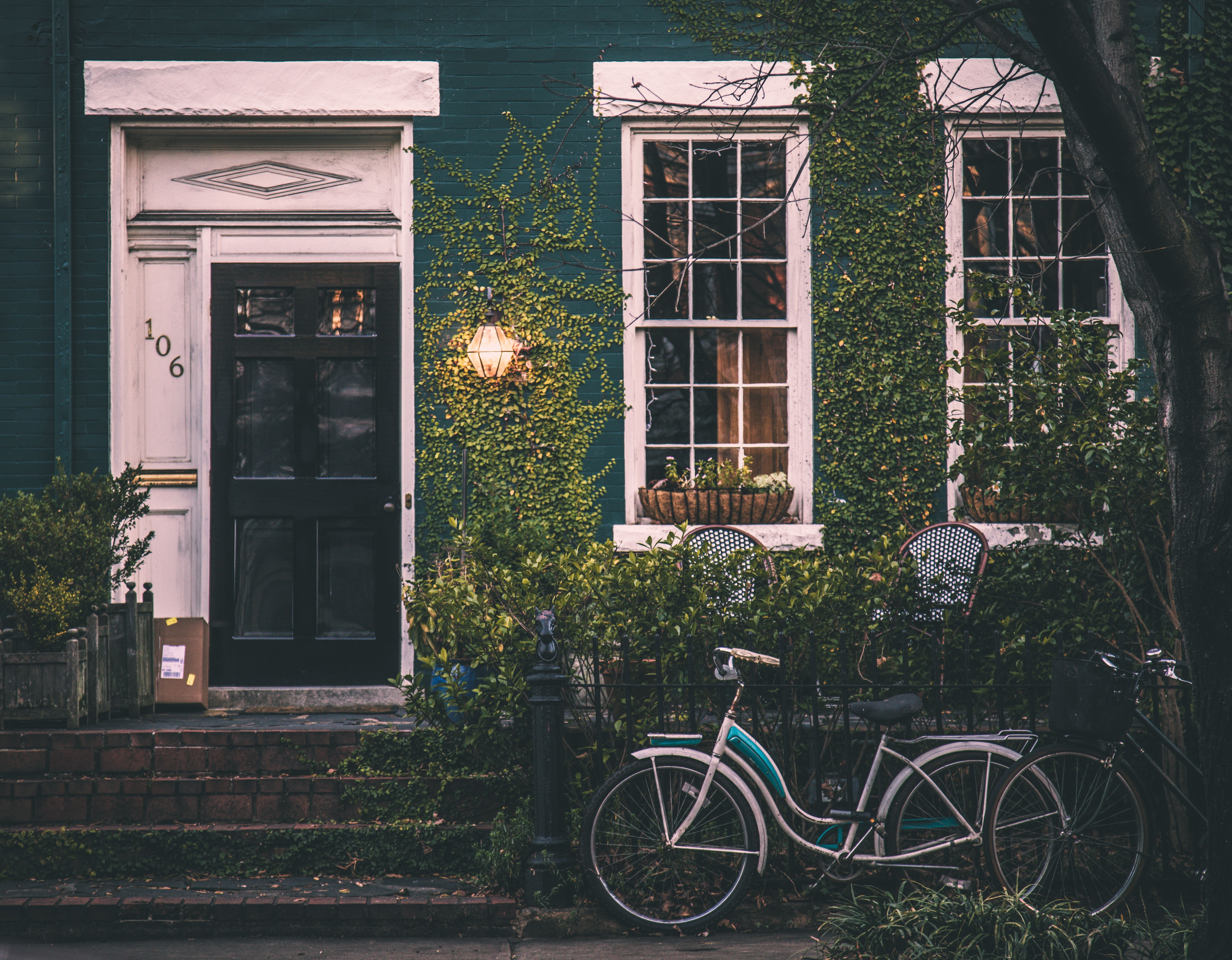 7361x5736 Download wallpaper 7361x5736 bicycle, fence, house, window HD background