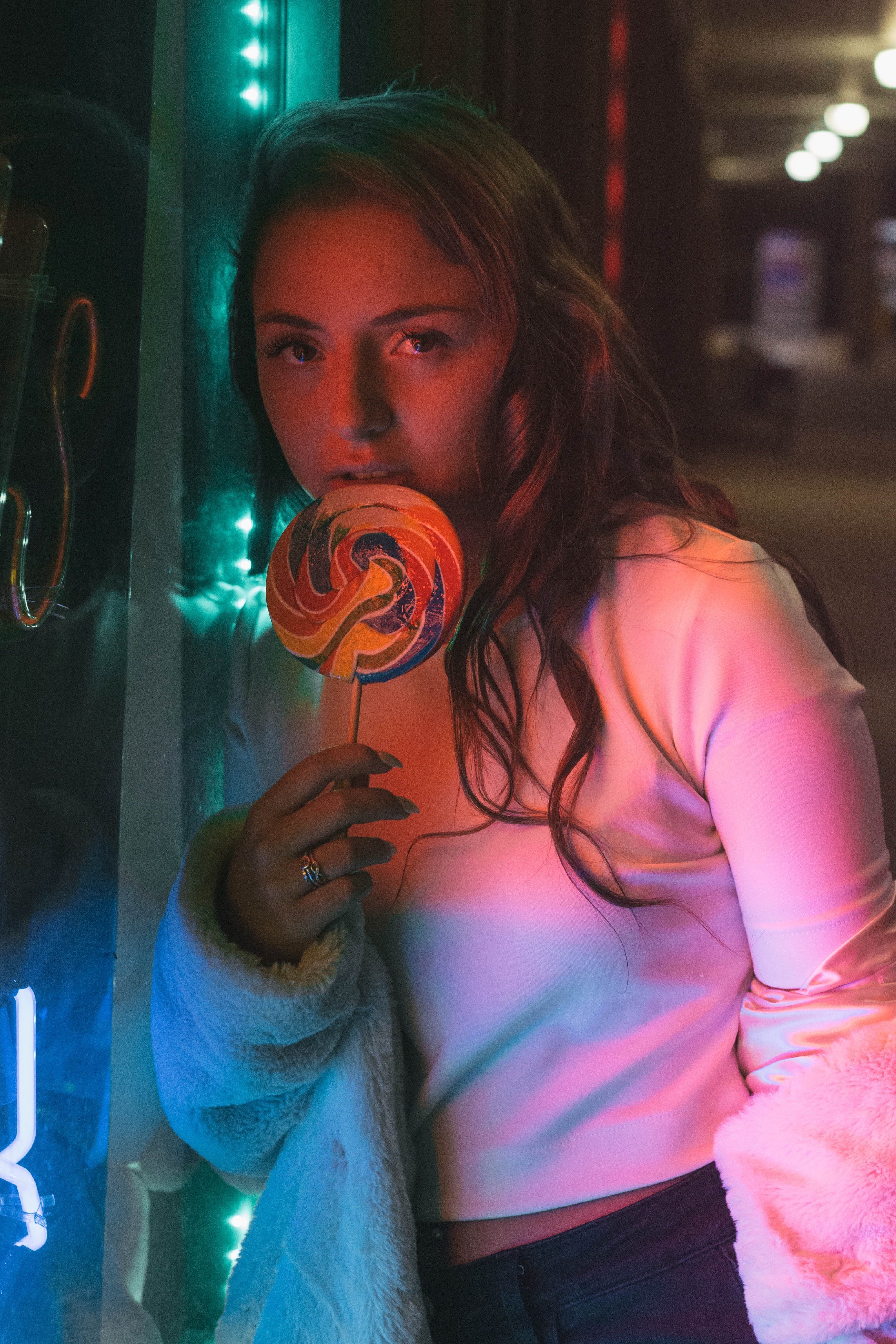 3229x4843 Wallpaper / woman woman with lollipop portrait and neon light HD 4k wallpaper free download