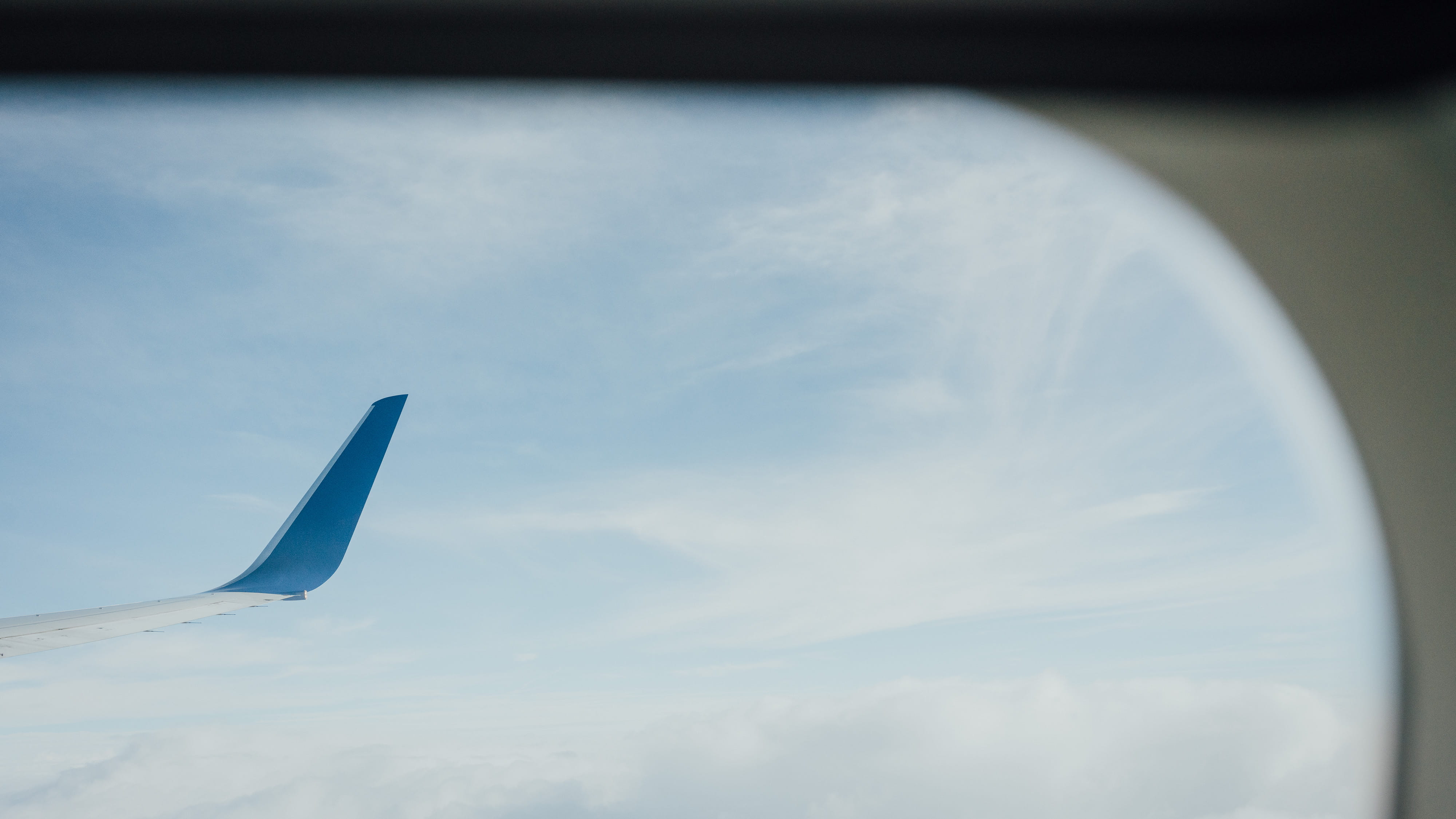 4000x2250 Wallpaper / atmosphere, business, speed, business Travel, flying, 4K, cloud, transportation, airplane, window seat, looking Through Window, cloudscape, outdoors, blue free download