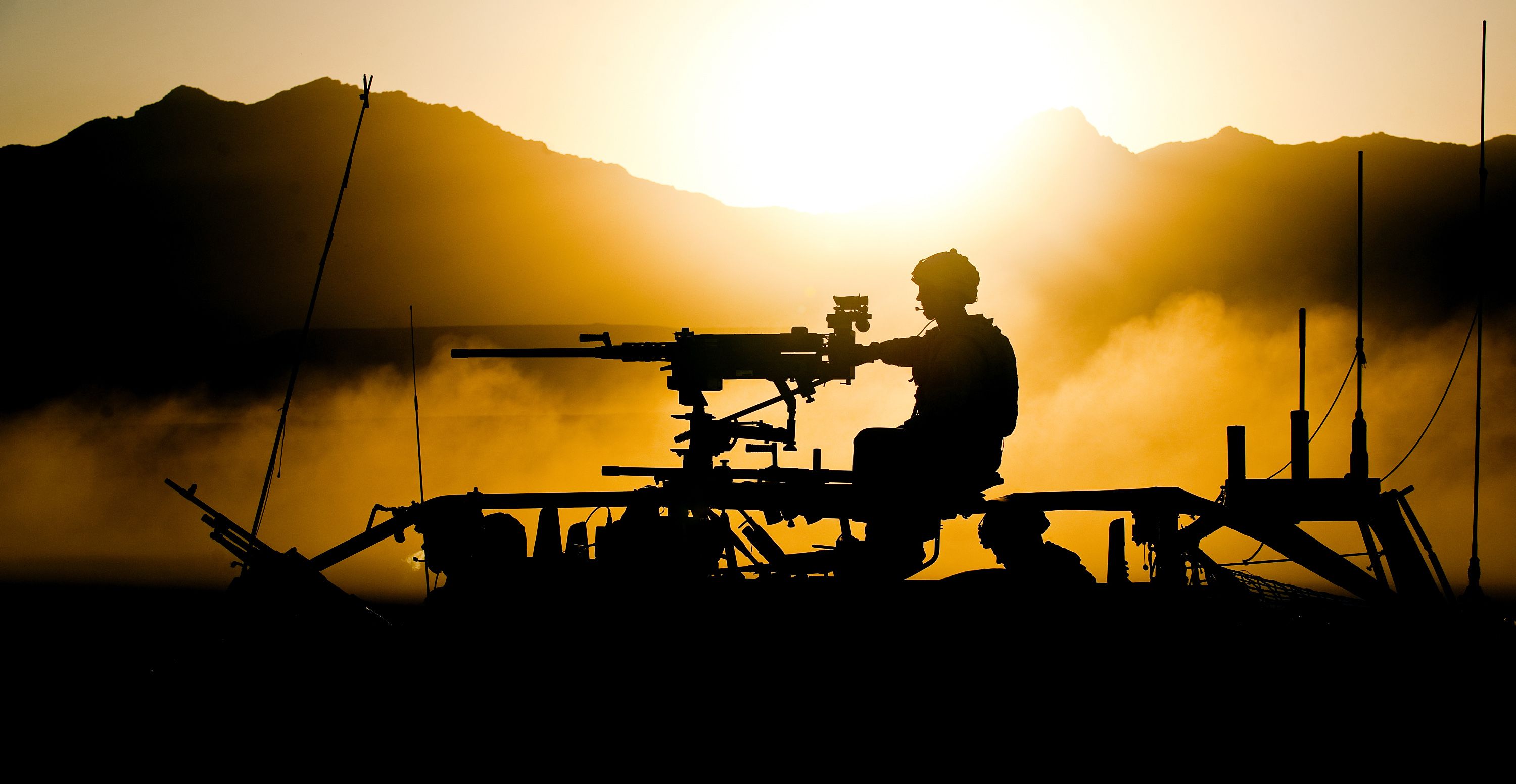 3000x1552 Commando Royal Marines in Afghan Sunset at End of Op Herrick 12 MOD