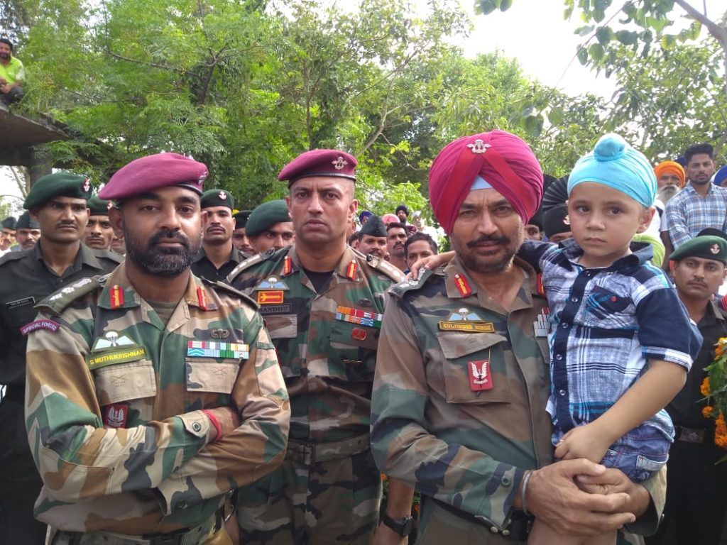 1024x768 Para SF commandos holding the son of Lance Naik Sandeep Singh who was a soldier of 4 PARA that took part in surgical strikes against Pakistan in September killed three terrorists