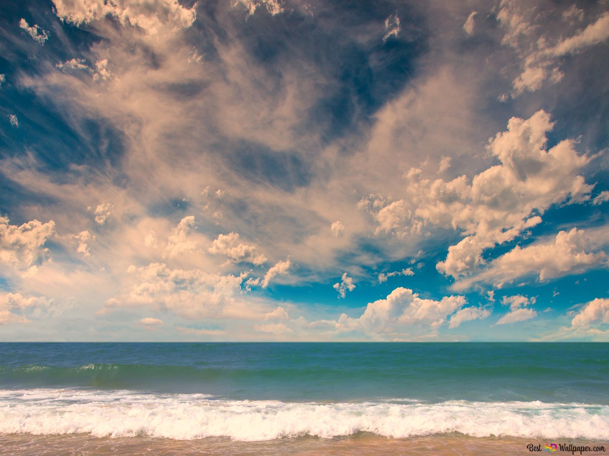 2048x1536 Ocean waves hitting the beach in cloudy weather 2K wallpaper download