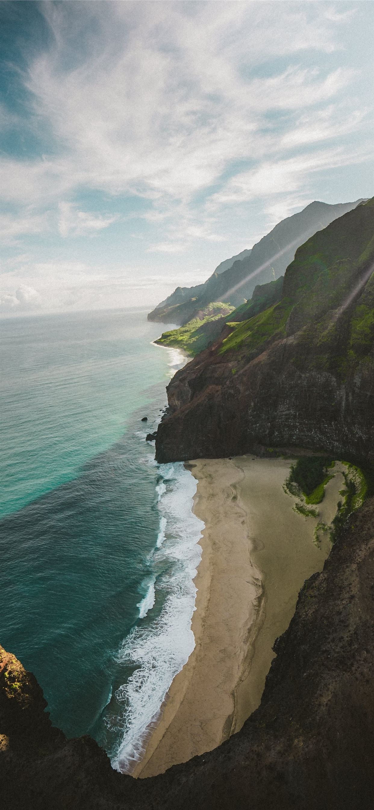 1242x2688 aerial photography of sea under cloudy sky during. iPhone Wallpaper Free Download