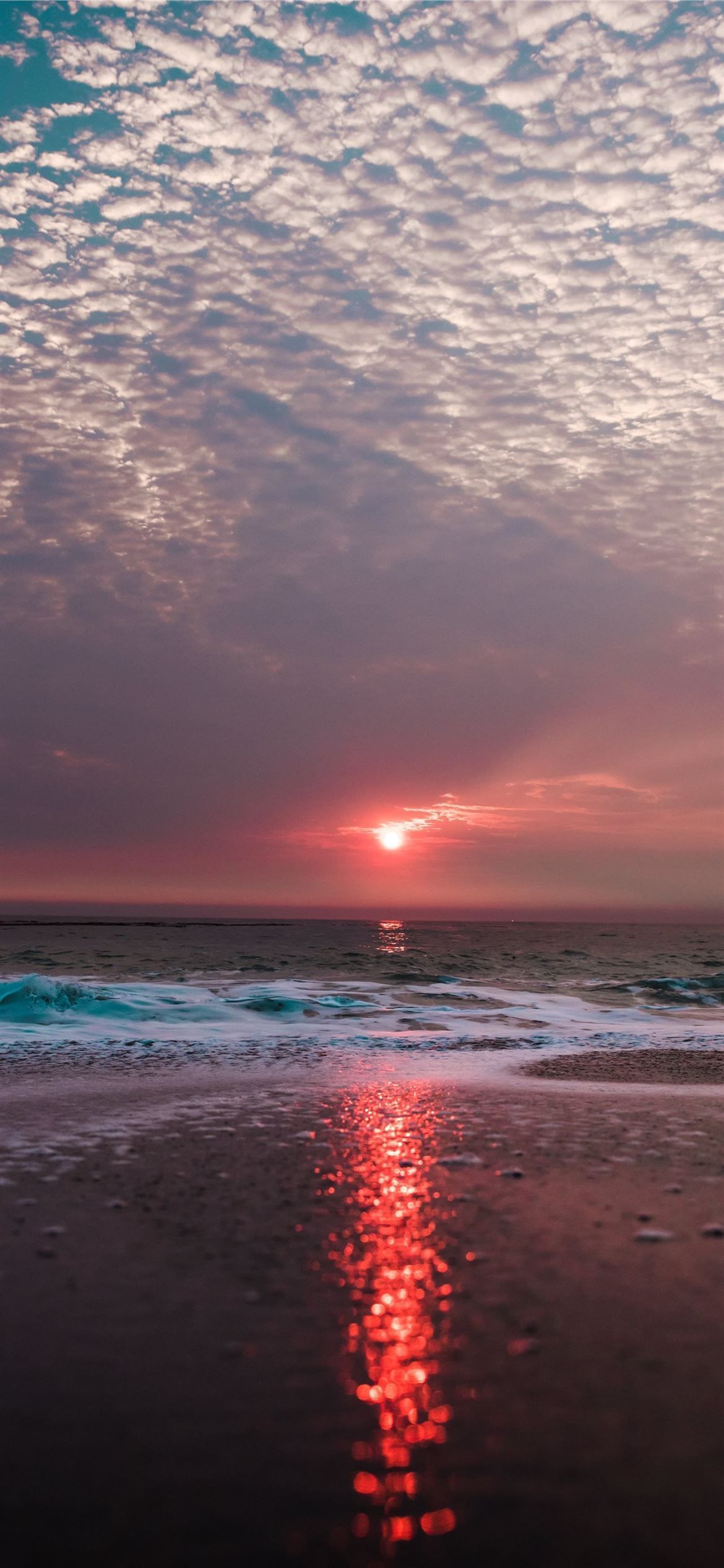 1170x2532 beach under cloudy sky during sunset iPhone Wallpaper Free Download