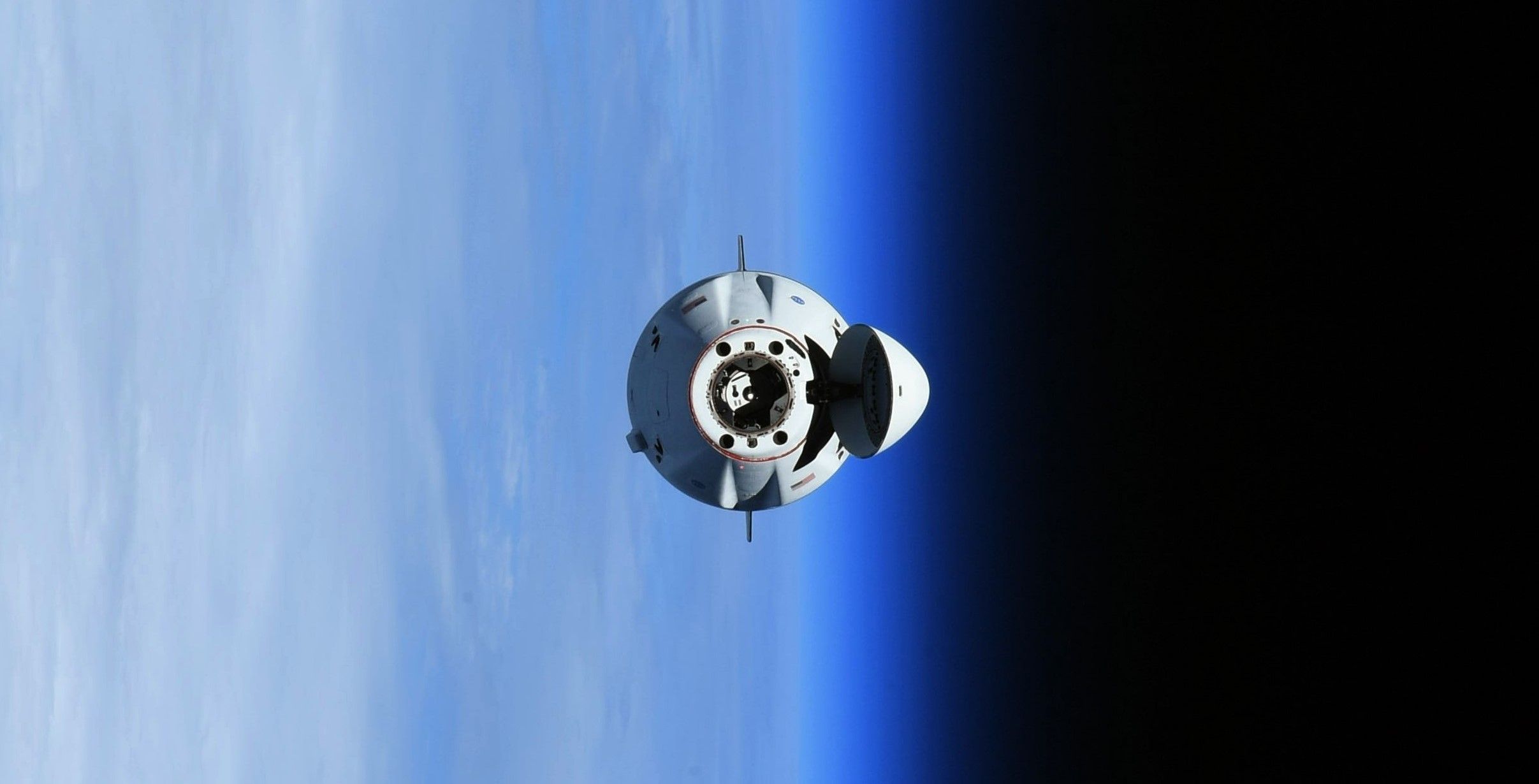 2414x1230 SpaceX Cargo Dragon joins Crew Dragon at the International Space Station