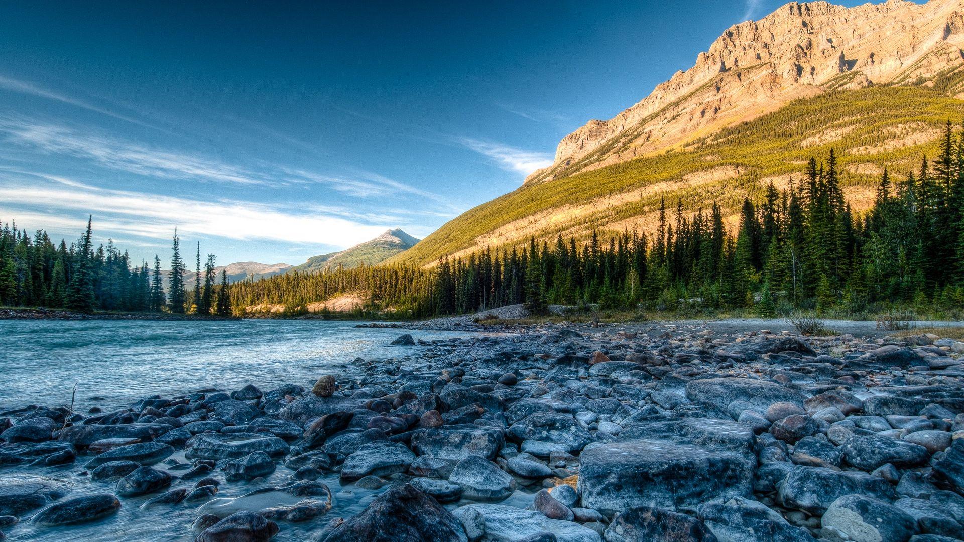 1920x1080 Download wallpaper 1920x1080 rocky mountains, river, stones