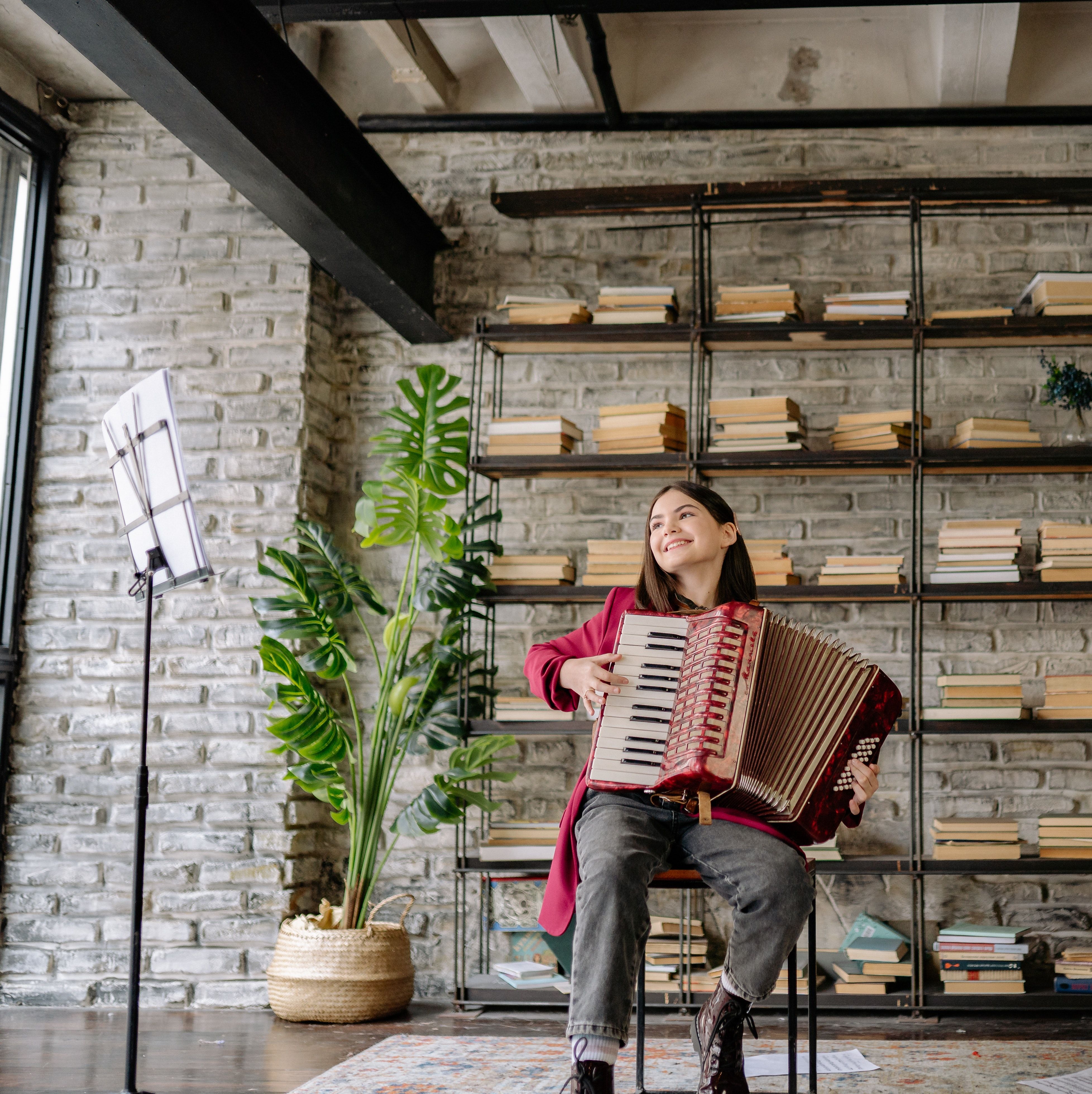 3912x3919 Young Girl Playing an Accordion · Free