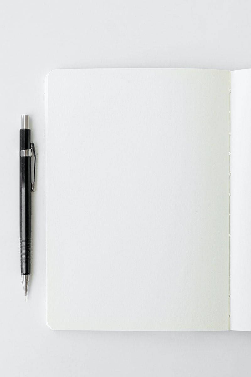 800x1200 Download Silver Pen on a Blank Page Wallpaper