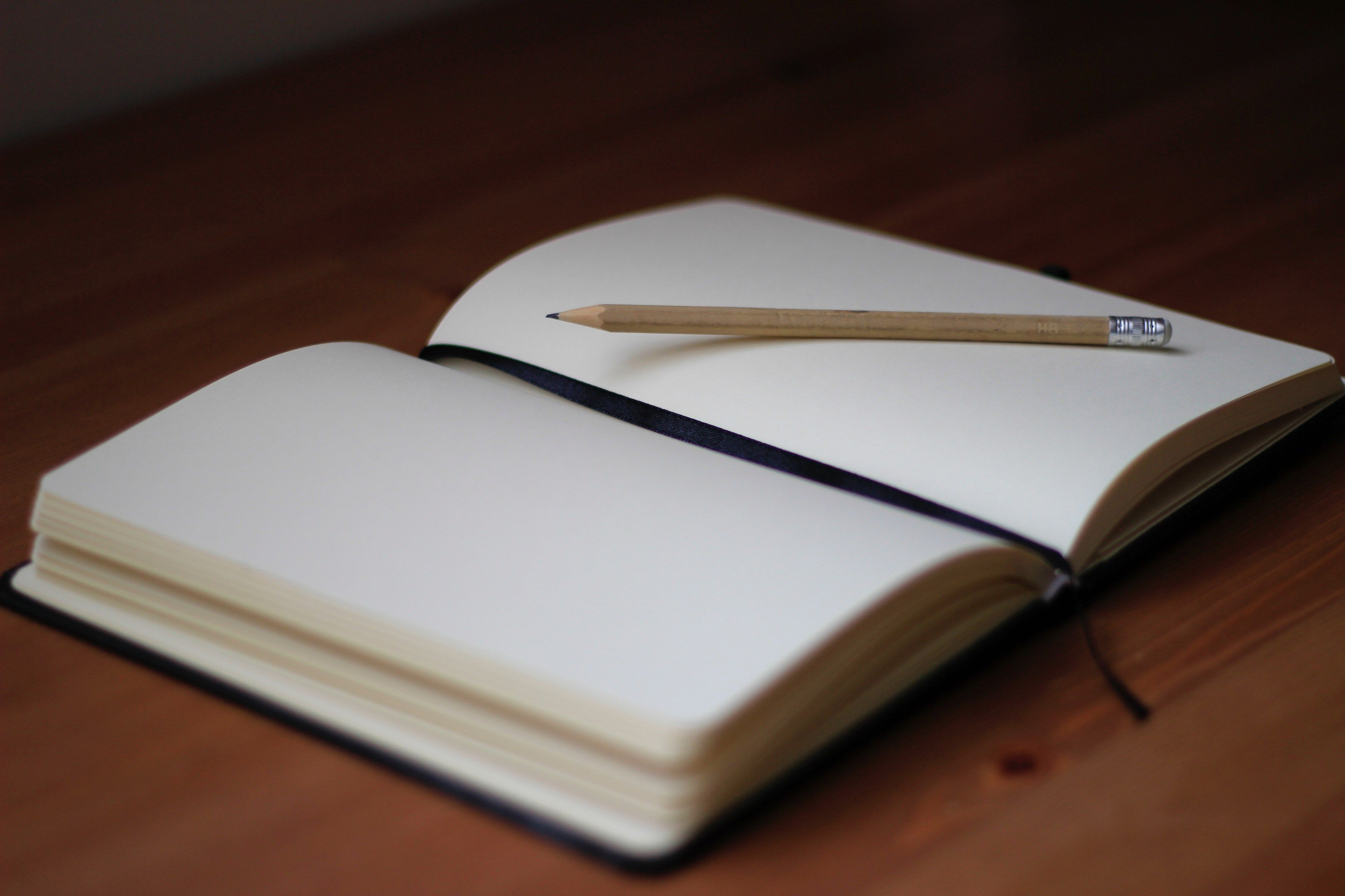 3840x2560 Wallpaper / a pencil on the blank pages of an open notebook, tabel day 4k wallpaper free download