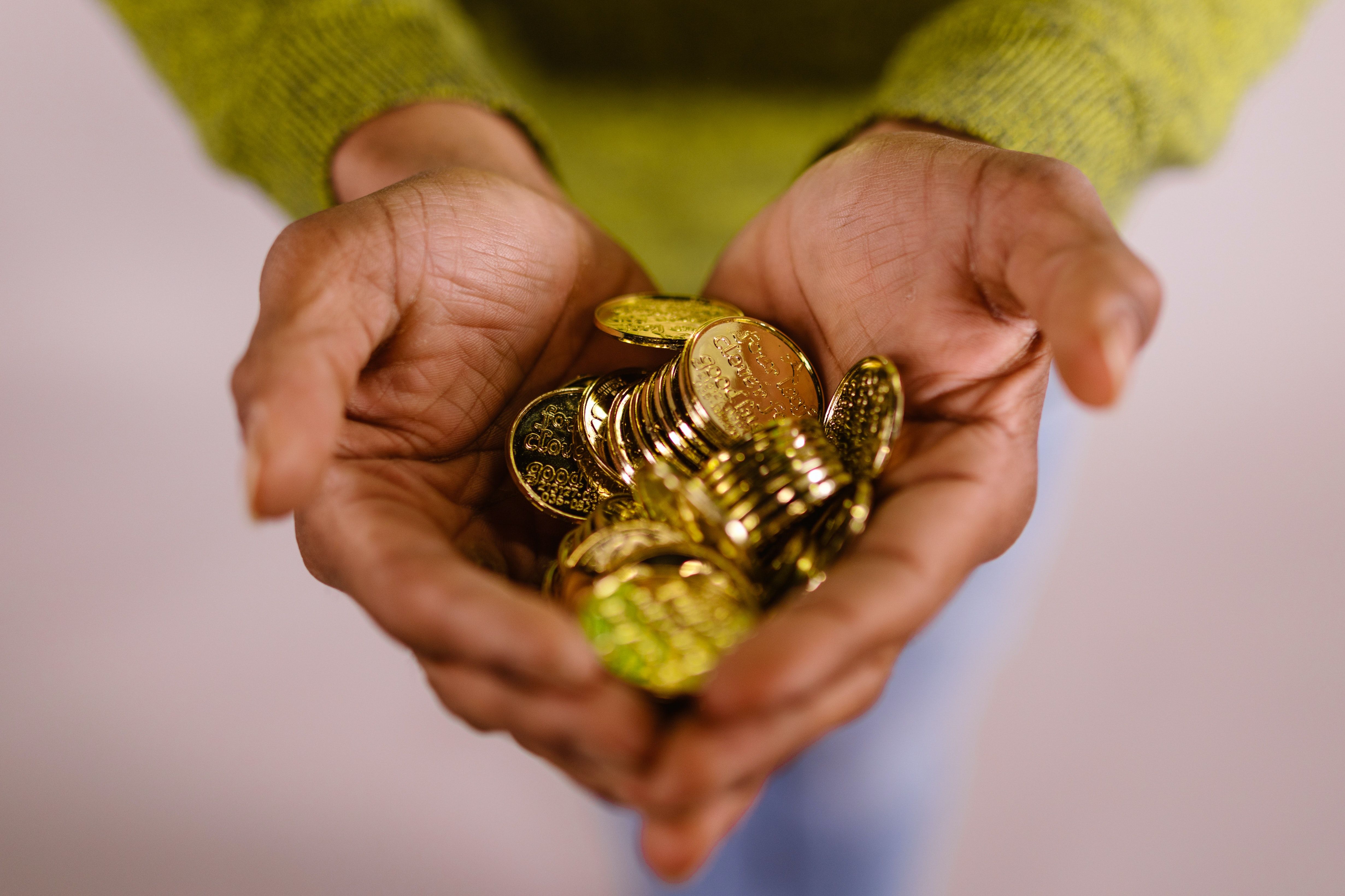 4922x3281 Gold Coins in Person's Hands · Free