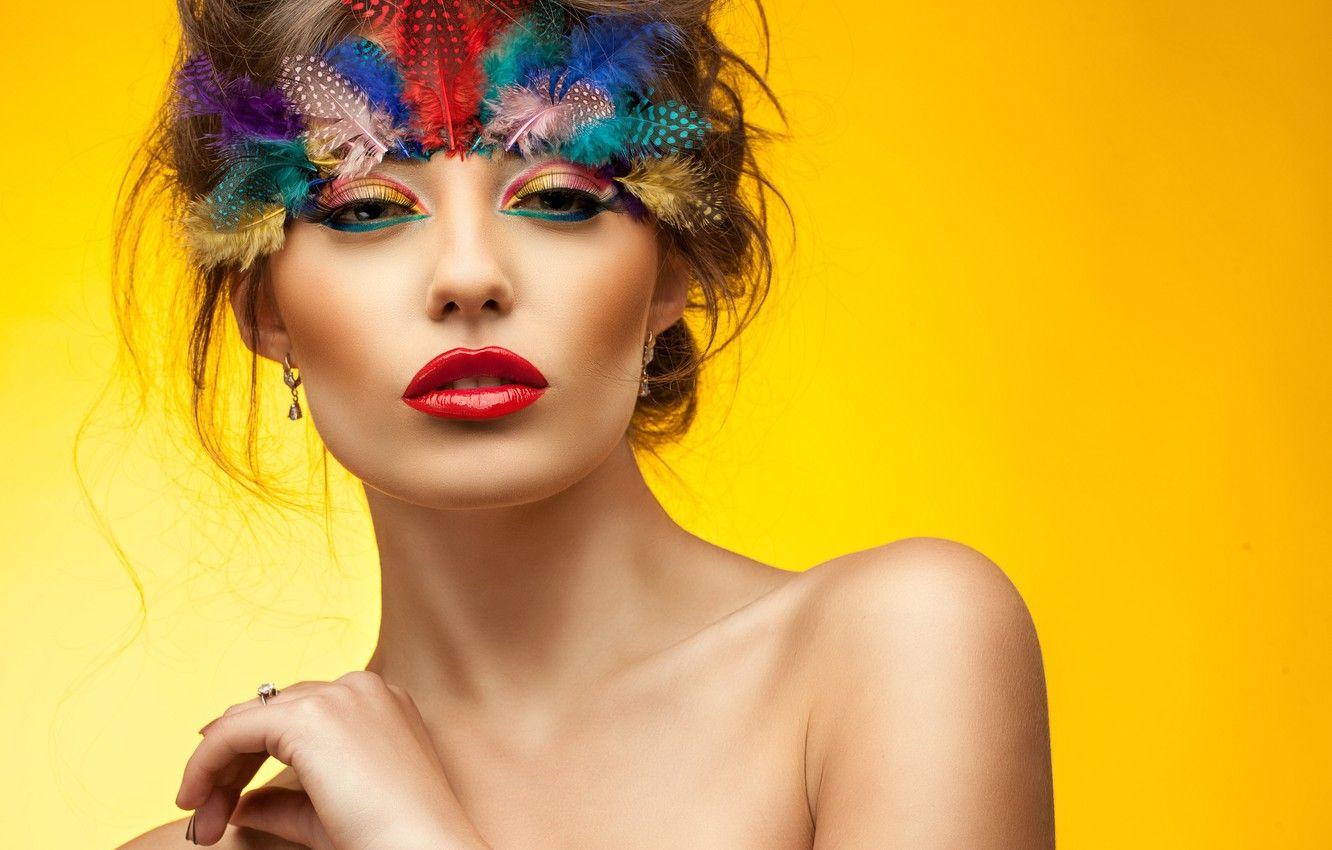 1332x850 Wallpaper eyes, look, girl, face, hand, feathers, makeup, shoulders