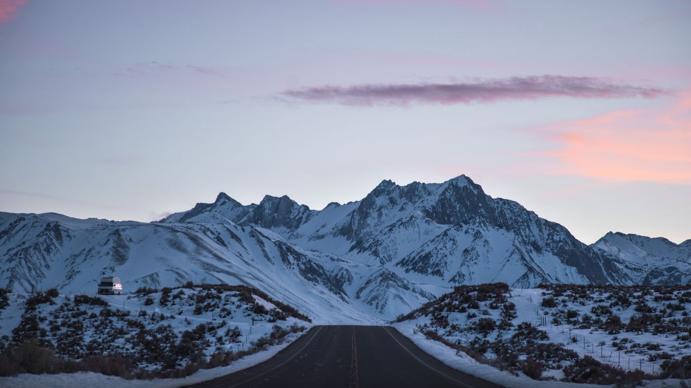 1366x768 Clean sky sunset mountains road wallpaper background.