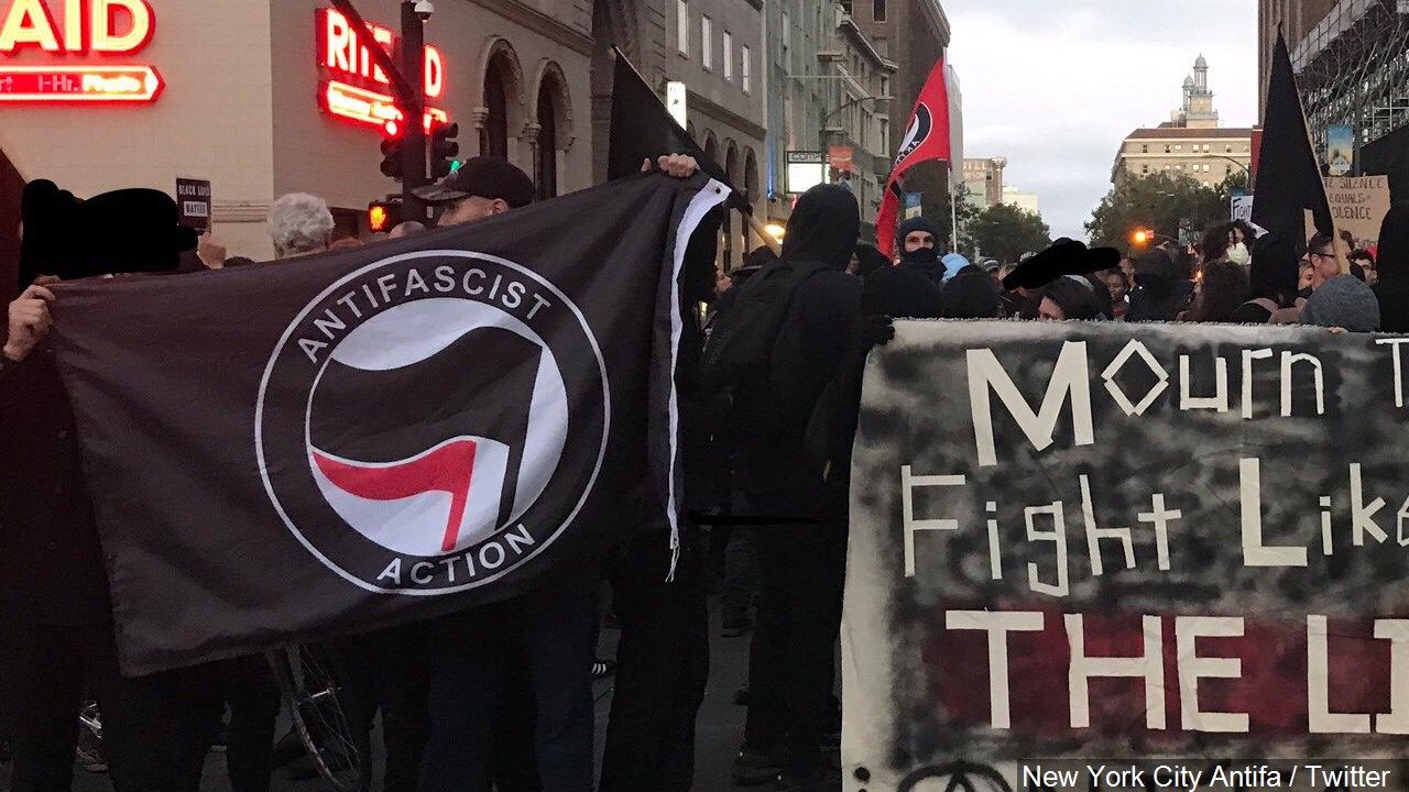 1280x720 AP FACT CHECK: Viral photo doesn't show 'antifa' beating cop
