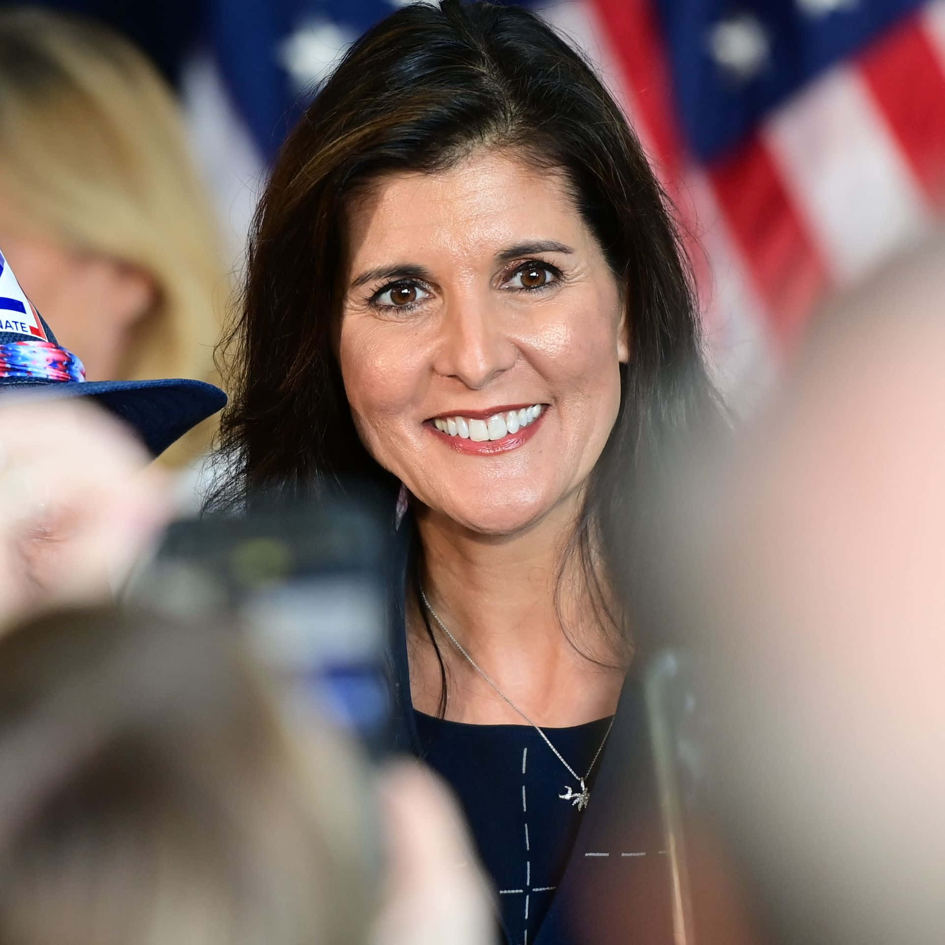 1920x1920 Download Nikki Haley Smiling: A representative of American diplomacy Wallpaper