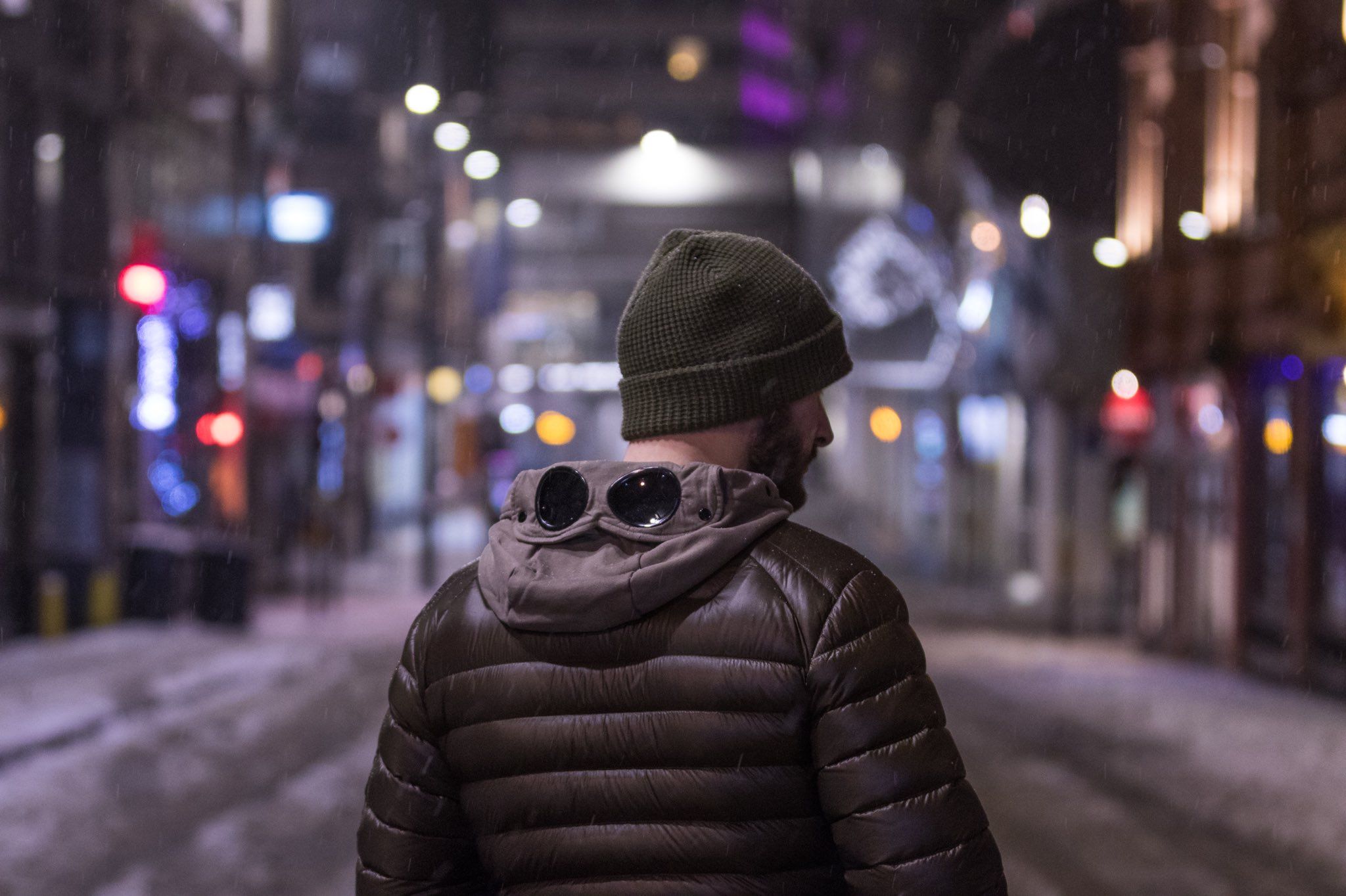 2048x1364 No. 50 Birmingham wears C.P Company Direct Down Jacket (Dark Olive) layered with C.P Company Diagonal Fleece Hooded Goggle Sweatshirt (Dark Olive) Poler Outdoor Stuff Workman Beanie