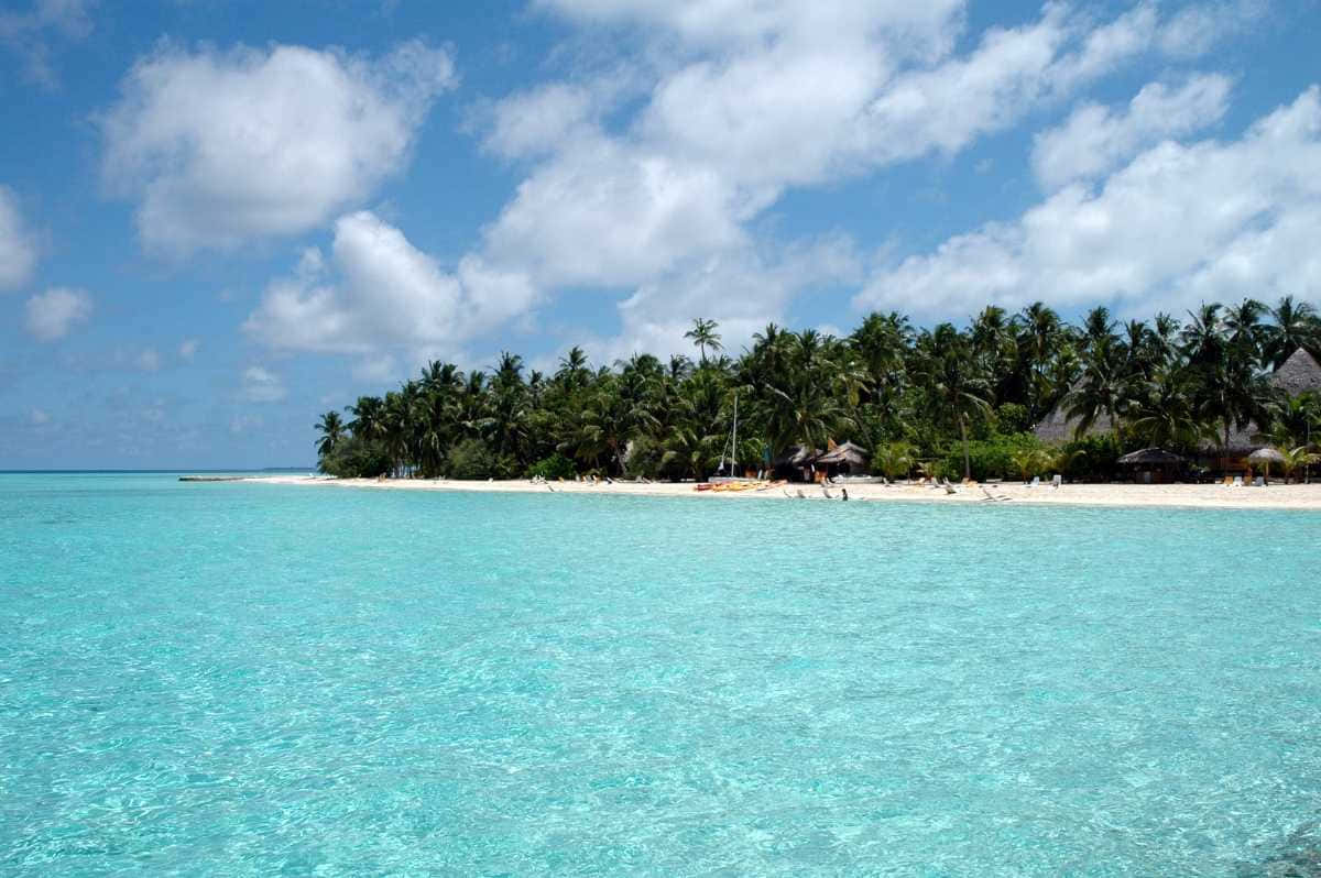 1200x798 Download Caption: Stunning Sunset At Maldives Island With Crystal Clear Water And Overwater Villa Wallpaper