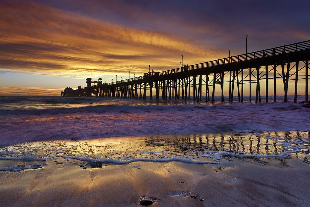 1024x683 Oceanside Surf Pier, California. A lone surfer