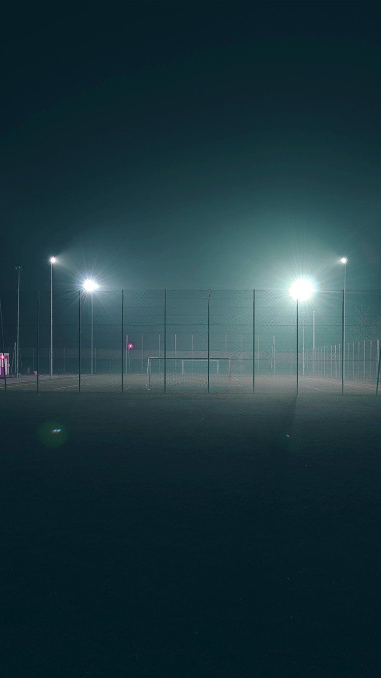 750x1334 iPhone 6 wallpaper. soccer field city night light dark green