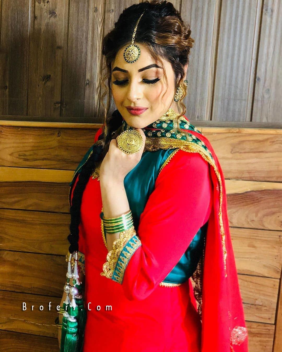 1080x1350 Punjabi Women Singer Wallpaper